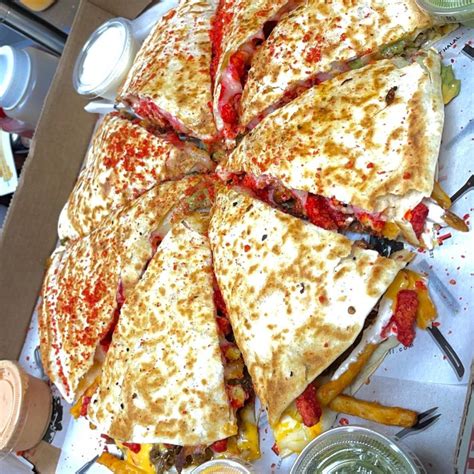 Fatima's grill - Sep 18, 2022 · You could make a quesadilla basic or you can come to Fatima’s grill and get a 3 meat hot Cheetos quesadilla here. The quesadilla has beef, chicken, and shrimp -grilled bell peppers and onions to top it off they add hot Cheetos and nacho cheese.... A huge quesadilla stuffed with all the goodies. When you take a bite is crunchy cheesy and meaty. 